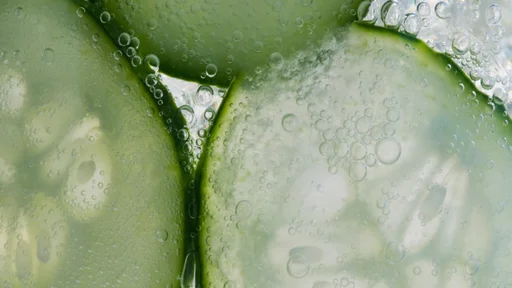 Freshly sliced cucumber in a bubbly soda