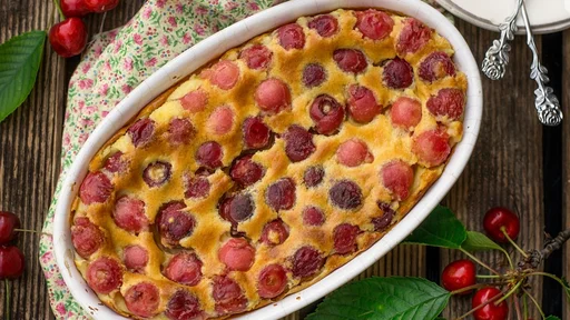 Homemade French dessert clafoutis clafouti with black cherries