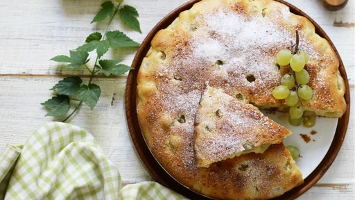 homemade pie cake biscuit with white fresh grapes