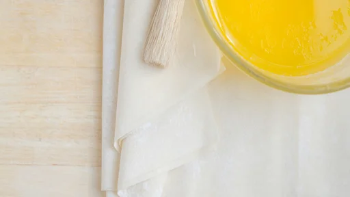 Raw Phyllo Dough Sheets with brush and butter