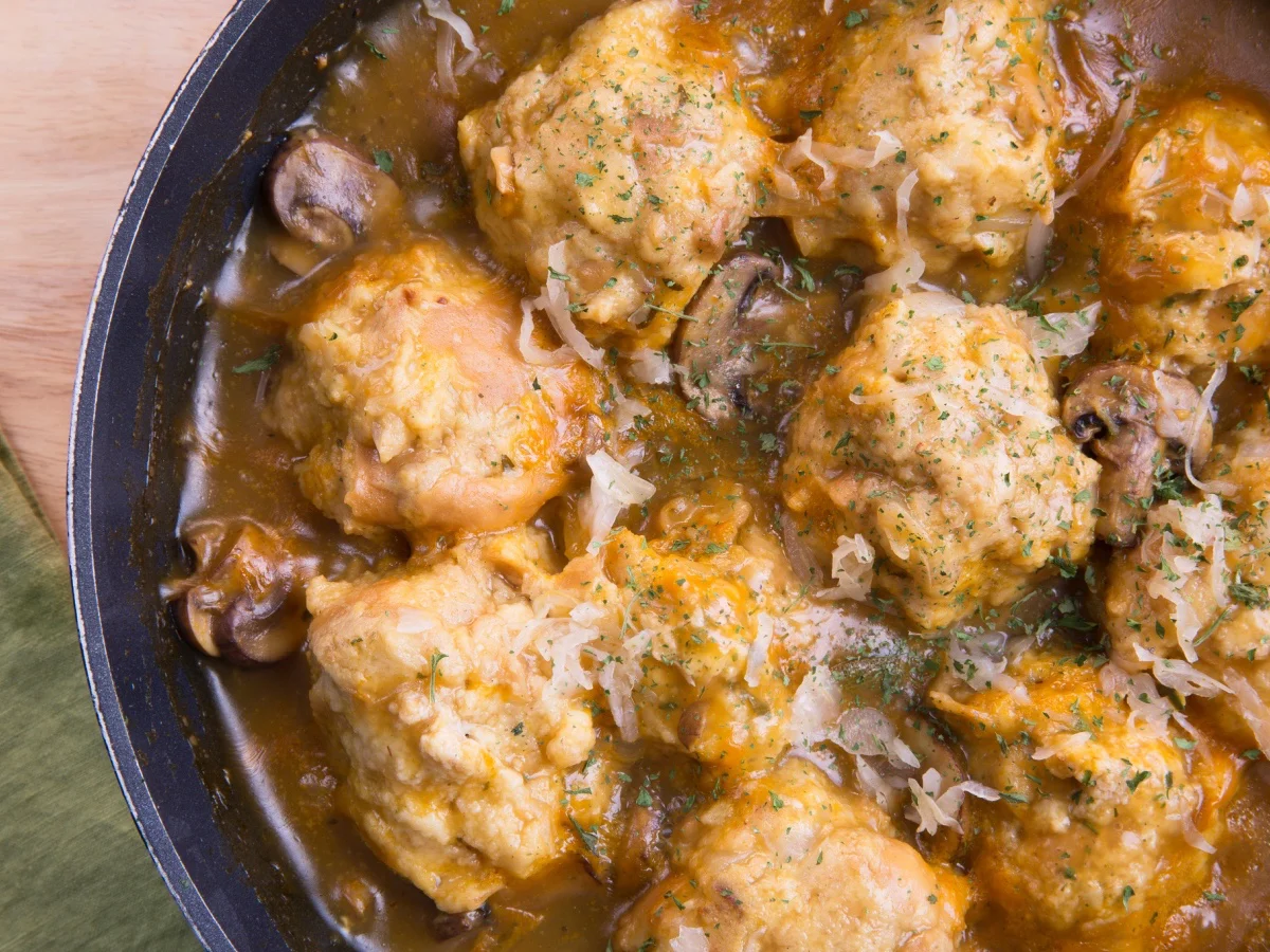 Fresh Bavarian bread dumplings with mushroom gravy sauce.