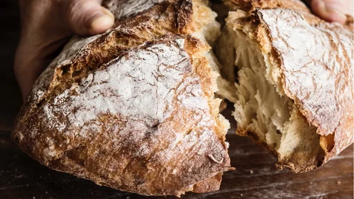 Tearing a bread loaf photography recipe idea