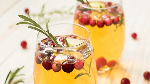 Rosemary cranberry white sangria with apples