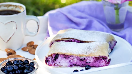 Strudel with blueberries. Food in nature. Summer cake. Pie, strudel with berries.