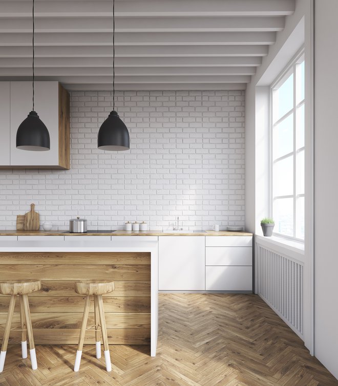 Pri oblikovanju kuhinje si lahko privoščimo kombiniranje različnih slogov; na primer minimalističnega in industrijskega. Foto: ismagilov/Thinkstock