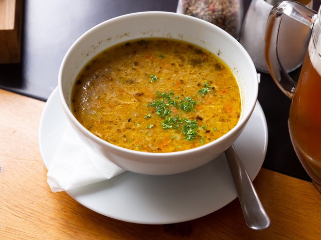 Traditional thick Czech soup (Polevka) with fried cabbage and minced beef meat